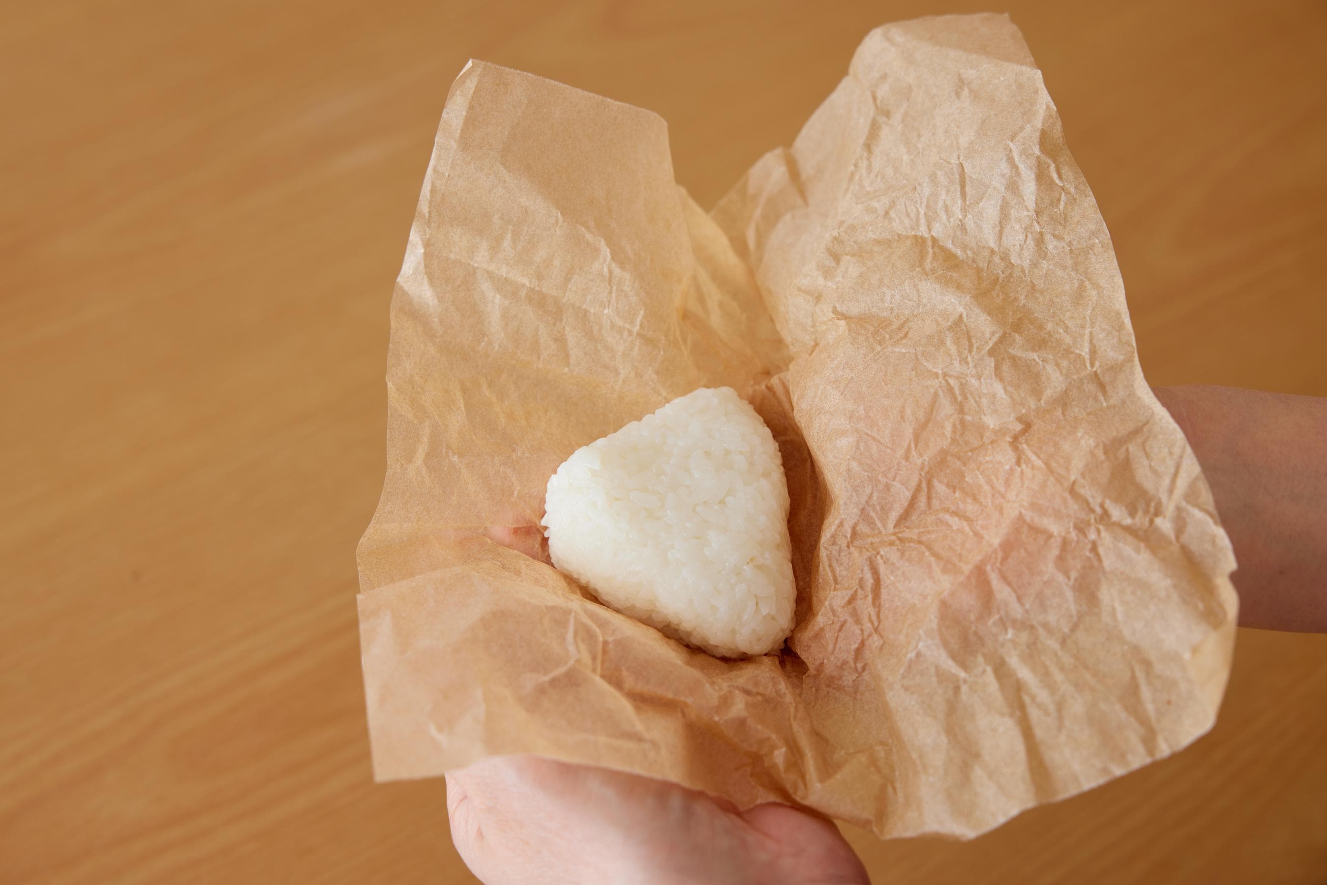 making Onigiri with parchment paper
