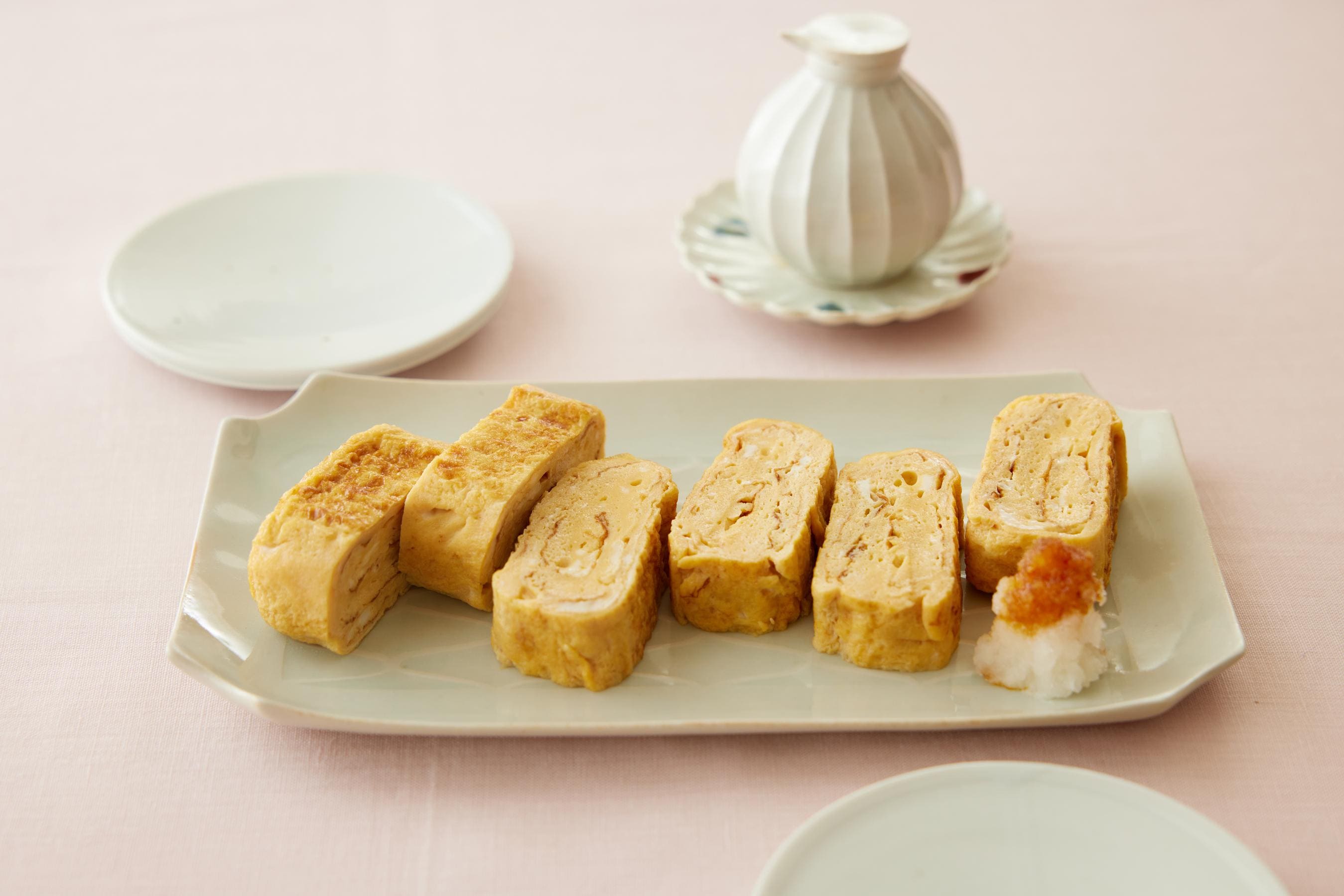 Tamagoyaki served on a plate.