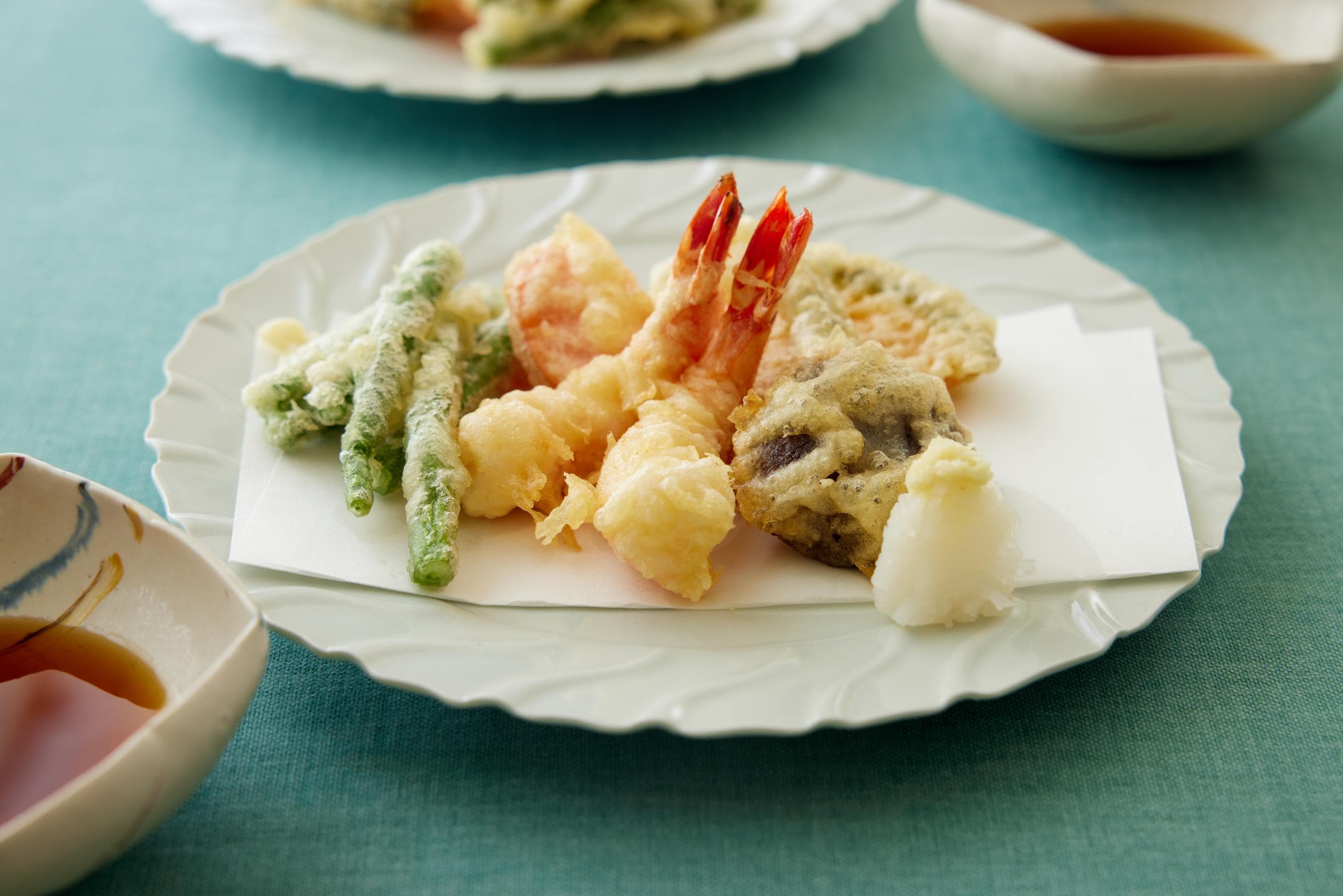 Arranging Tempura on a plate.
